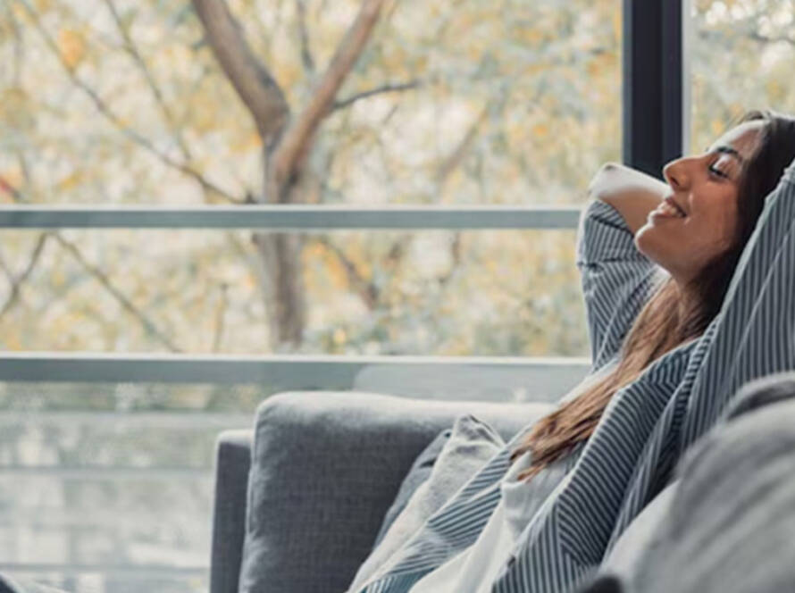 woman relaxing tiny home